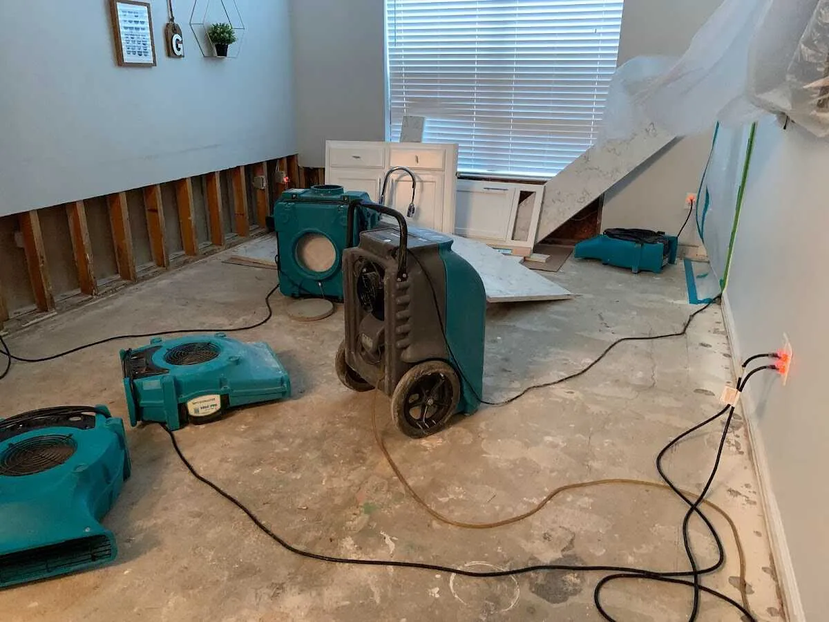 Dehumidifier in flood-cut room for Water Damage Restoration in Springfield